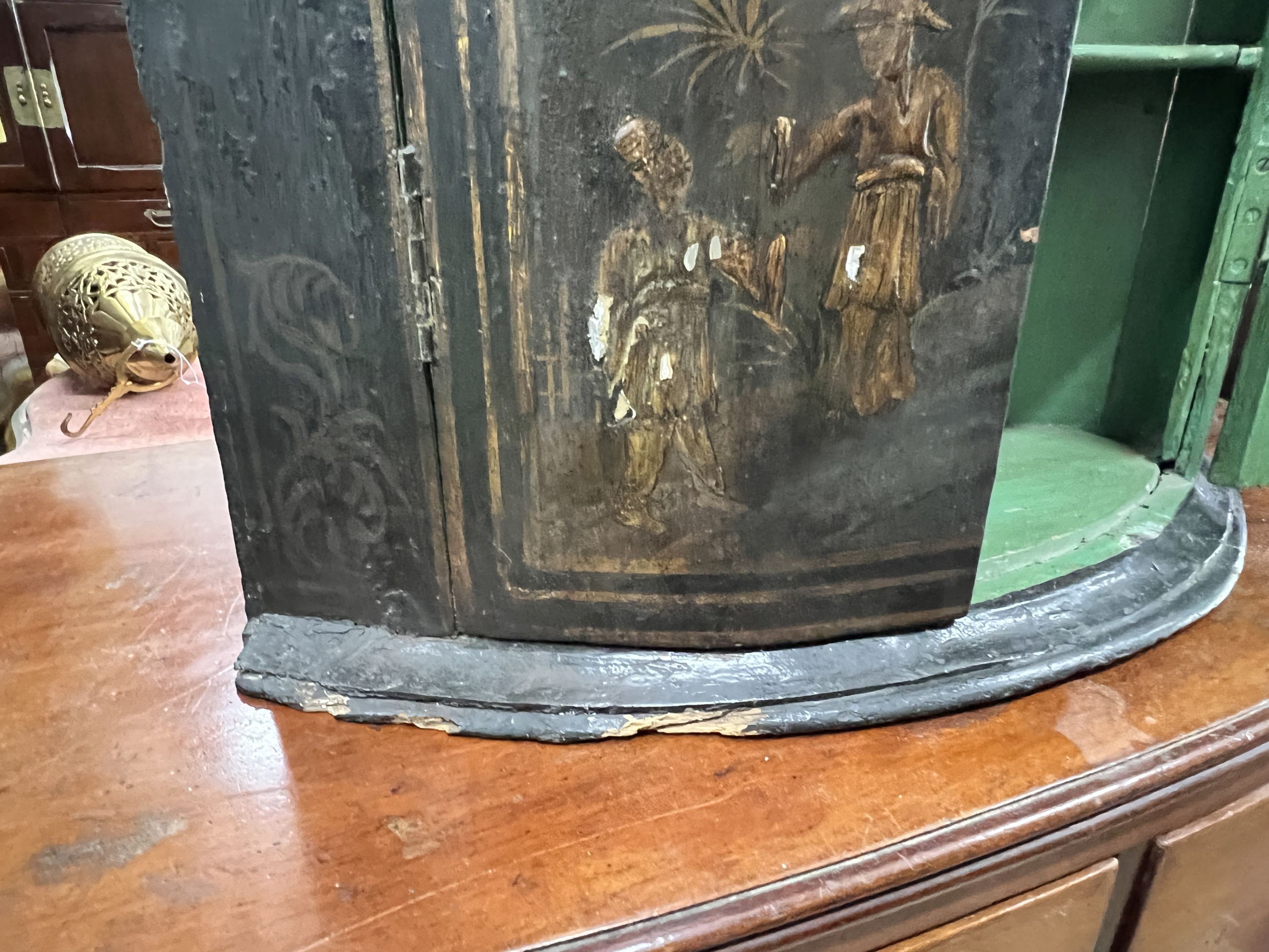 A 19th century chinoiserie lacquer bowfront hanging corner cabinet, width 56cm, depth 34cm, height 91cm